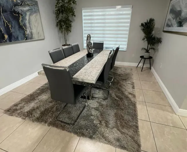 Elegant dining room in a Coral Gables-style home after an Ire Cleaning Services clean