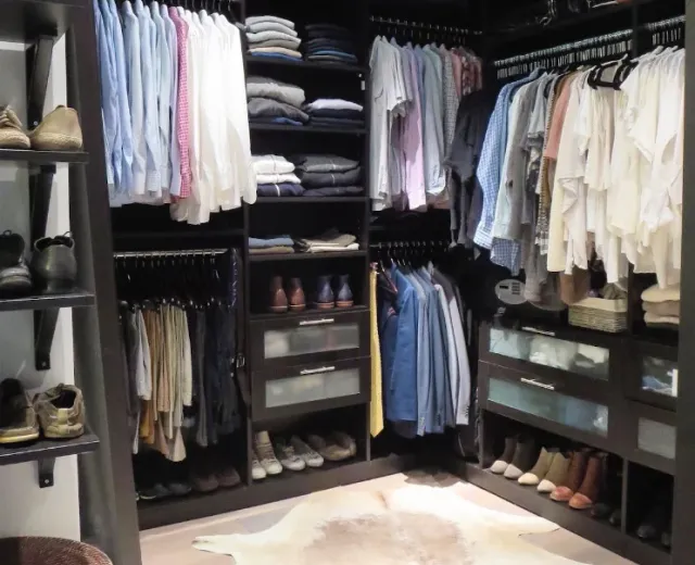 Organized closet in an Edgewater-style condo after an Ire Cleaning Services organization visit