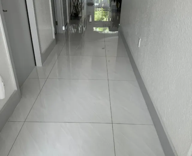 Polished tile hallway in a Coral Way-area home after an Ire Cleaning Services clean