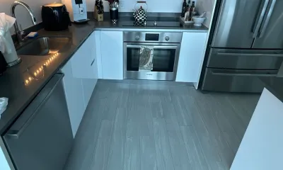 Modern high-rise condo kitchen after an Ire Cleaning Services apartment cleaning